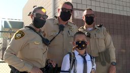 01 las vegas officers escort kid to school