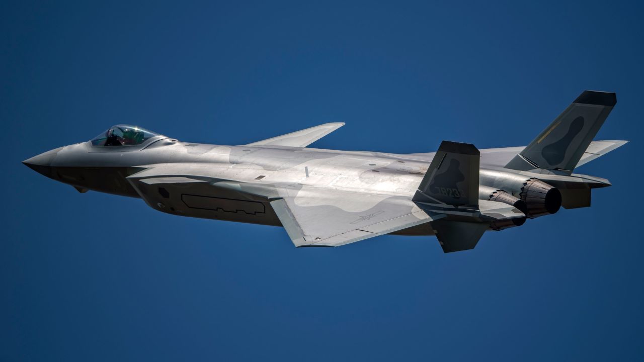 A J-20 stealth fighter jet of the Chinese People's Liberation Army Air Force flies during a training session in Zhuhai city, China, in 2018. 