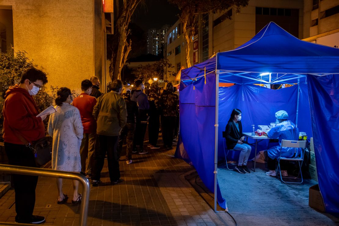 Hong Kong residents wait in line for Covid-19 tests on January 31, 2021.