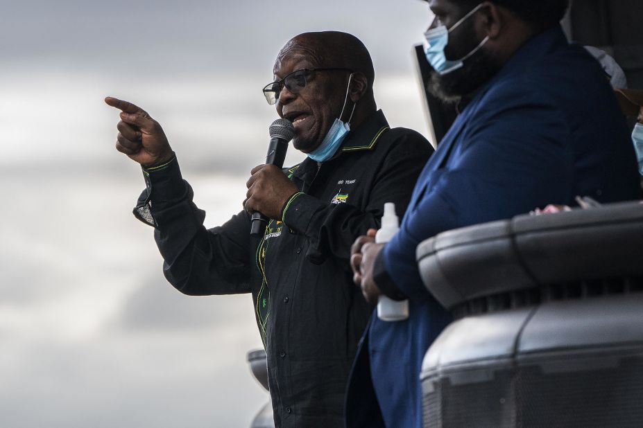 Zuma addresses supporters at his home in Nkandla, South Africa, in July 2021. In June, South Africa's highest court found Zuma guilty of contempt of court and <a href="https://www.cnn.com/2021/06/29/africa/jacob-zuma-contempt-sentencing-intl/index.html" target="_blank">sentenced him to 15 months in prison.</a> The order stemmed from Zuma's refusal to appear at an anti-corruption commission to answer questions about his alleged involvement in corruption during his time as president. <a href="https://edition.cnn.com/2021/07/04/africa/jacob-zuma-courts-south-africa-intl/index.html" target="_blank">Zuma likened his treatment to apartheid-era detention without trial.</a>