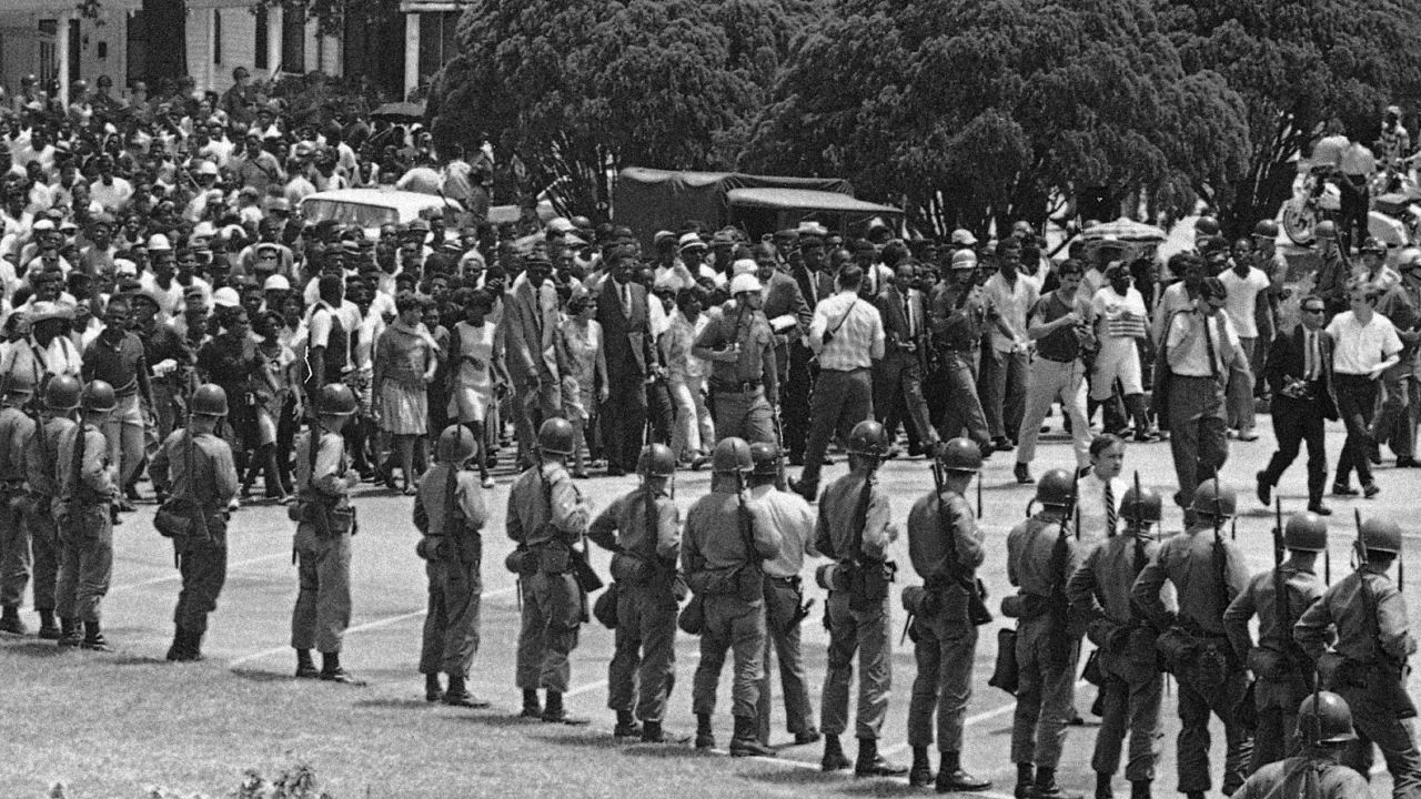 Nearing the end of the 10-day journey, civil rights marchers arrived at the Louisiana Capitol, with hundreds of members of the National Guard lining the street.