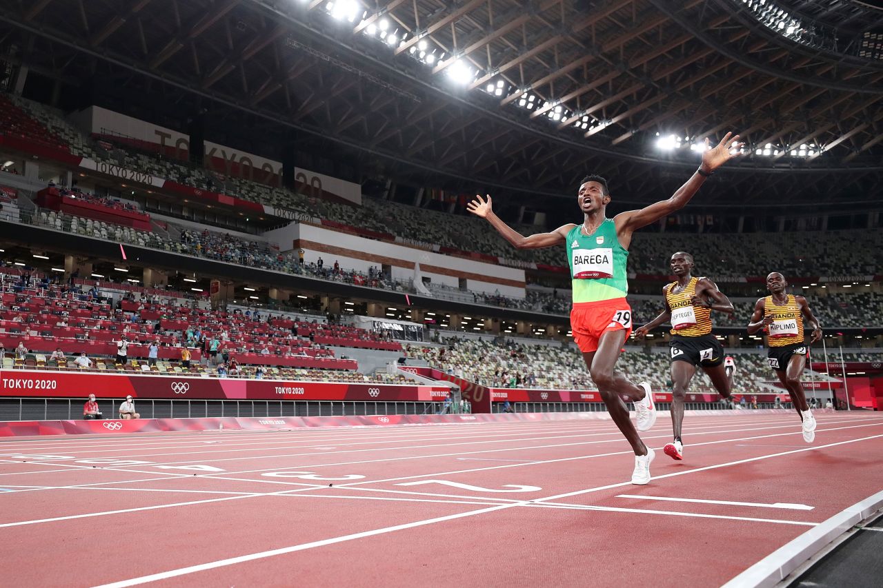 <strong>Selemon Barega, Ethiopia:</strong> Crossing the finish line ahead of Ugandans Joshua Cheptegei and Jacob Kiplimo, Barega captured the gold medal in the men's 10,000 meters.