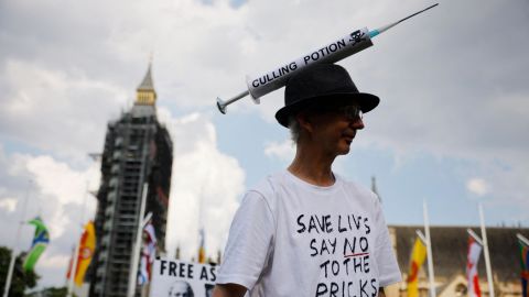 Anti-vaccination protesters against the coronavirus vaccine gather in Parliament Square outside the Houses of Parliament in central London on July 19, 2021