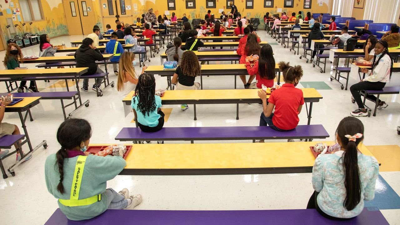 Students eat their lunch socially distanced at Belvedere Elementary School in West Palm Beach, Florida, on August 10, 2021.