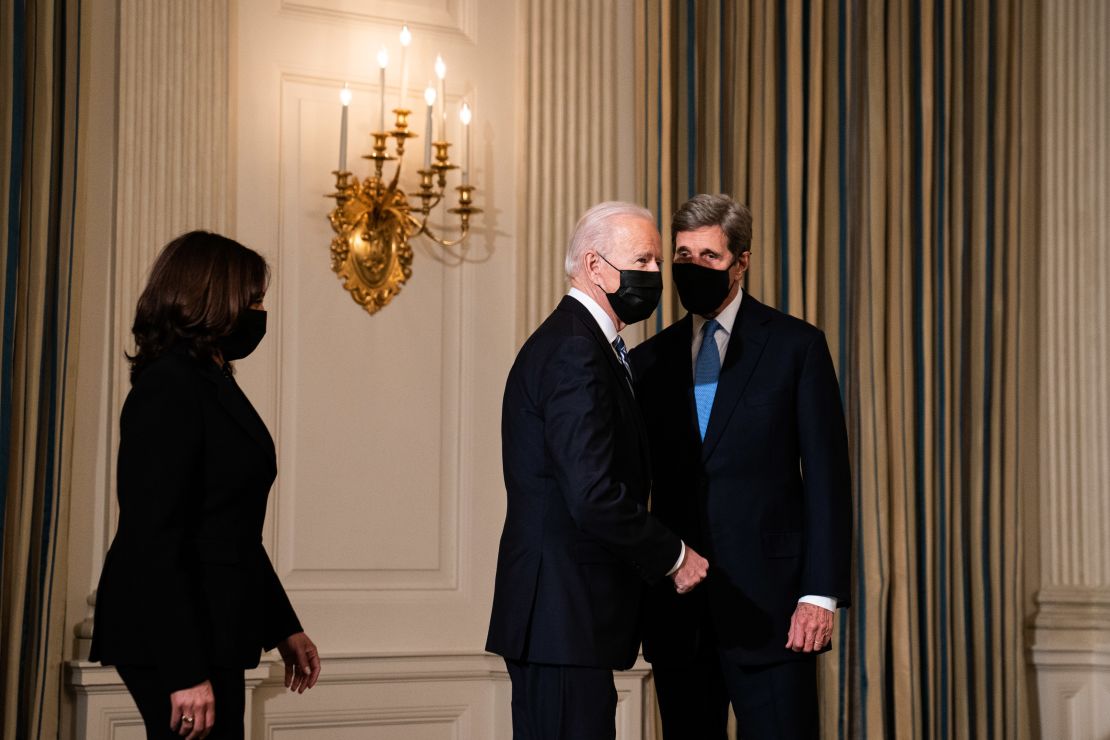 President Joe Biden and Vice President Kamala Harris with Special Presidential Envoy for Climate John Kerry in the State Dining Room of the White House in January.