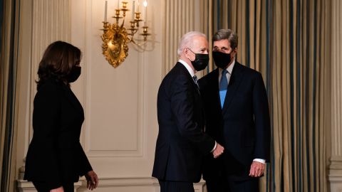 President Joe Biden and Vice President Kamala Harris with Special Presidential Envoy for Climate John Kerry in the State Dining Room of the White House in January.