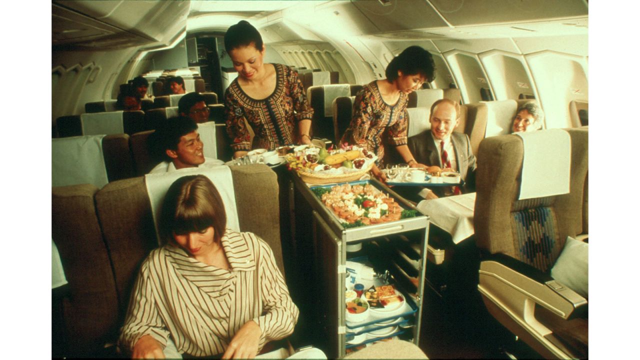 <strong>Singapore Airlines:</strong> Flying was still glamorous in the 1980s on the Business Class upper deck. 