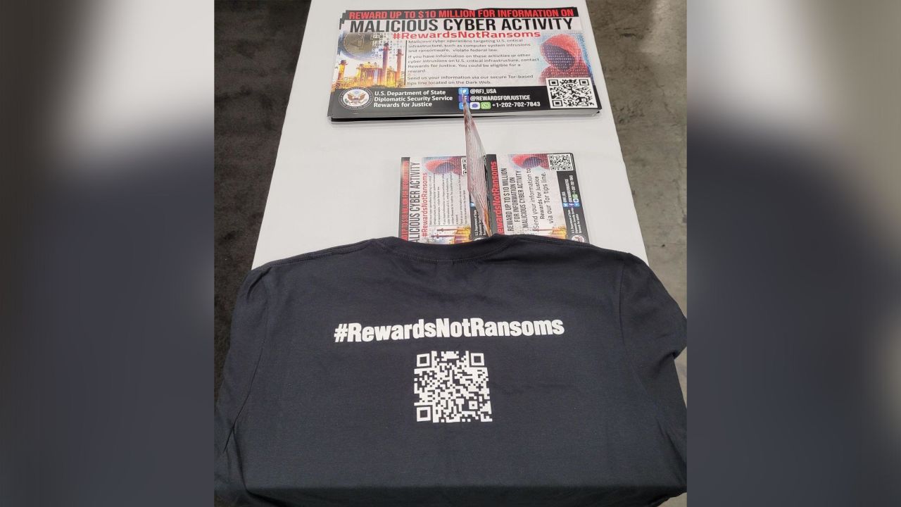 The Rewards for Justice table at the Black Hat Cyber Conference in Las Vegas promoting the launch of the new cryptocurrency reward.