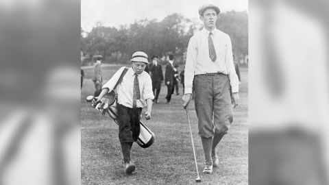 Francis Ouimet and his caddie, Eddie Lowery, play golf at Brookline in 1913.