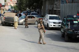 Afghan security personnel arrives at the area where the director of Afghanistan's Government Information Media Center Dawa Khan Menapal was shot dead in Kabul, Afghanistan, Friday, Aug. 6, 2021.