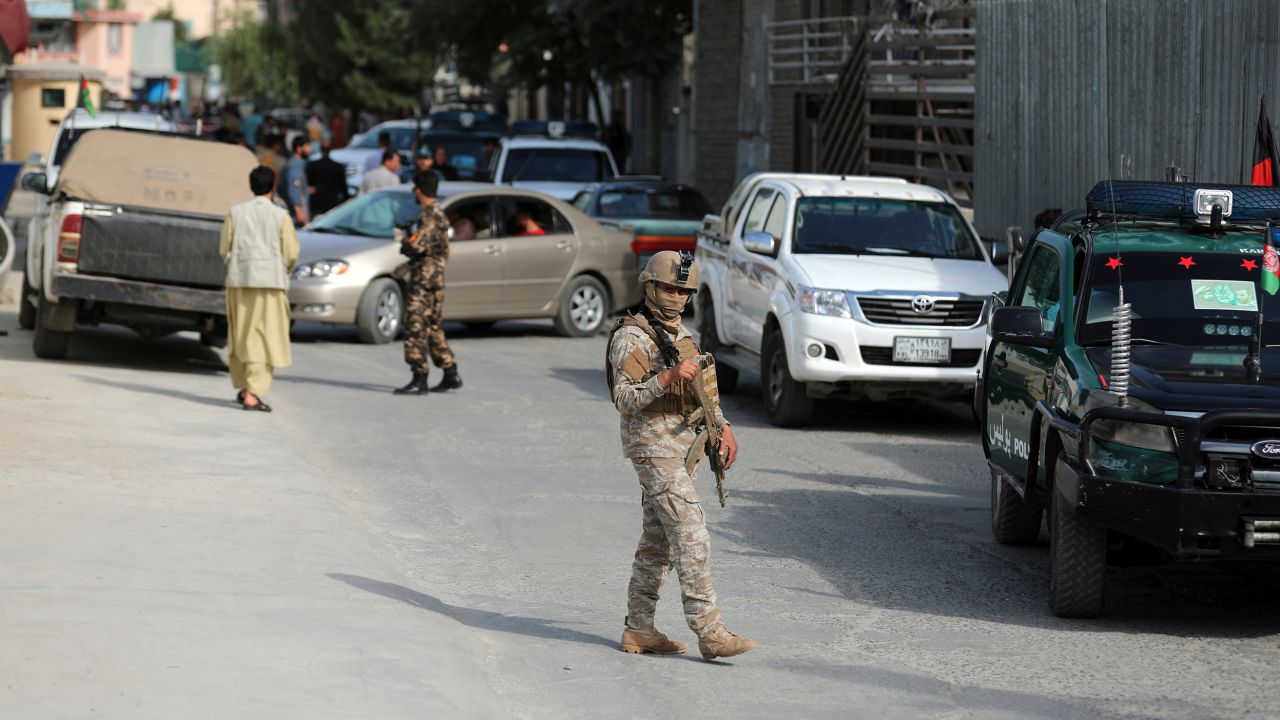 Afghan security personnel arrives at the area where the director of Afghanistan's Government Information Media Center Dawa Khan Menapal was shot dead in Kabul, Afghanistan, Friday, Aug. 6, 2021.