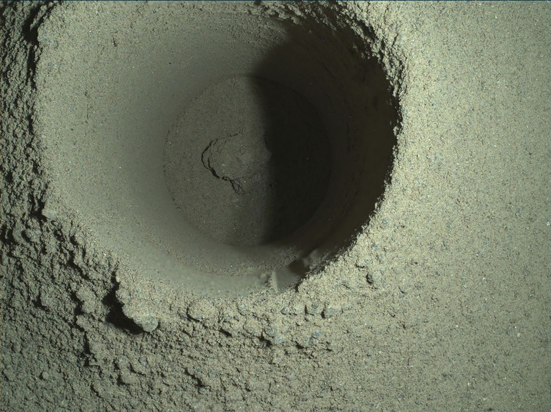 This image shows the first borehole drilled on Mars by the Perseverance rover.