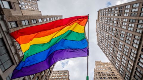 A rainbow flag is seen flying as thousands of New Yorkers took to the streets of Manhattan to participate in the Reclaim Pride Coalition's third annual Queer Liberation March.