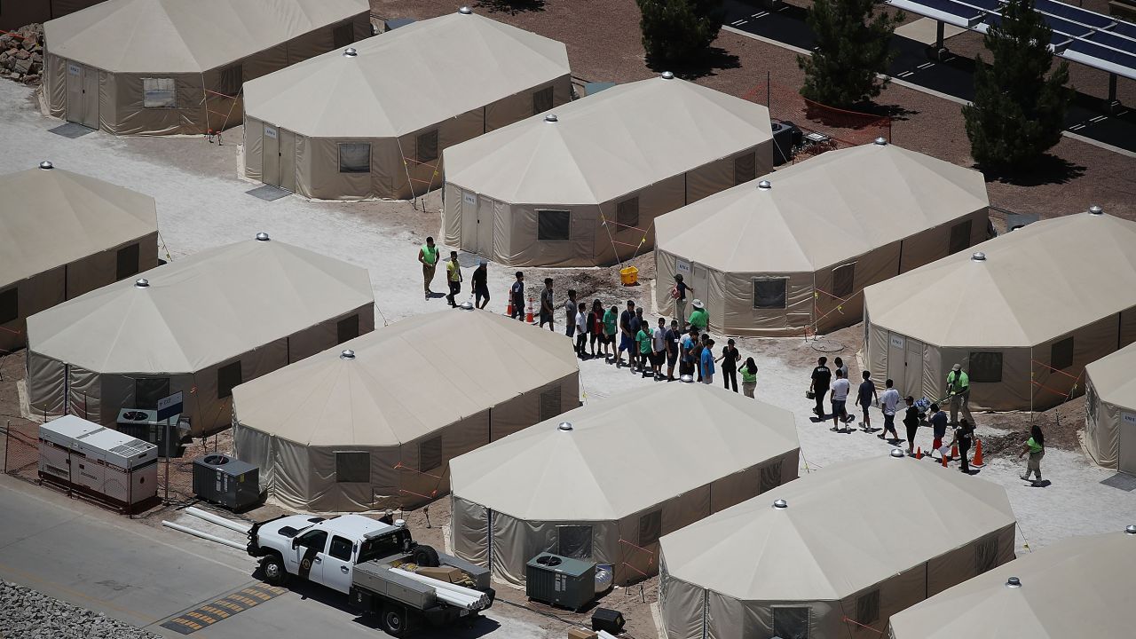 In this June 19, 2018, file photo, children and workers are seen at a tent encampment near the Tornillo Port of Entry in Tornillo, Texas. The Trump administration had used the Tornillo tent facility to house immigrant children separated from their parents.