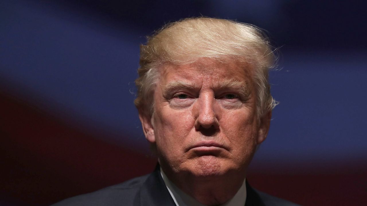 VIRGINIA BEACH, VA - SEPTEMBER 06:  Republican presidential nominee Donald Trump pauses during a campaign event September 6, 2016 in Virginia Beach, Virginia. Trump participated in a discussion with retired Army Lieutenant General Michael Flynn.  (Photo by Alex Wong/Getty Images)