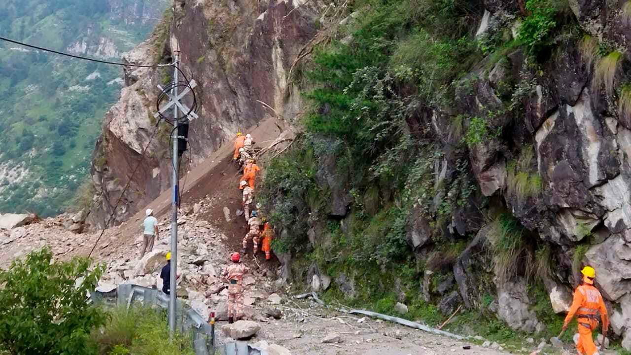 Soldiers from India's National Disaster Response Force at the site of a landslide in Kinnaur district in Himachal Pradesh state on August 11.