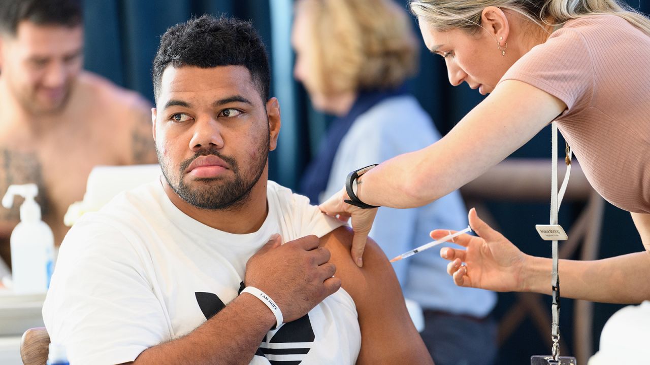 Tongan rugby star Samisoni Taukei'aho recieves his Covid-19 jab at Peppers Clearwater Resort on July 29, 2021 in Christchurch, New Zealand.