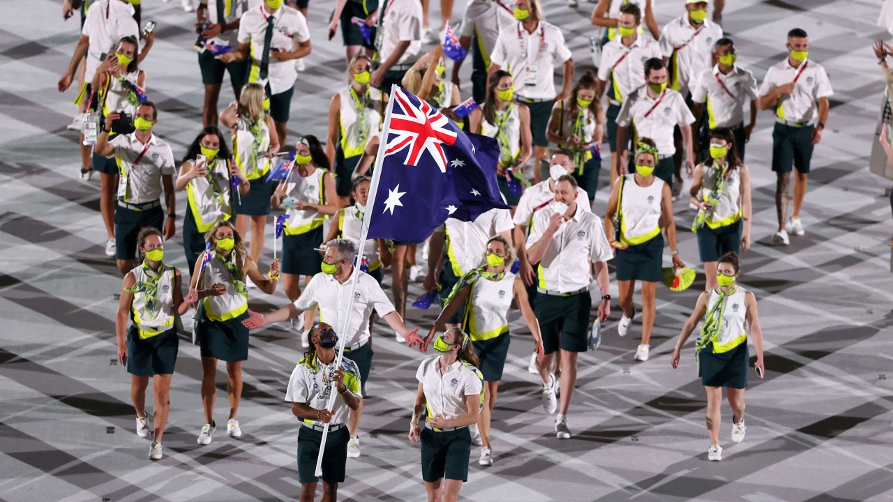 Flag bearers Cate Campbell and Patty Mills of Team Australia lead their team in during the Opening Ceremony of the Tokyo 2020 Olympic Games at Olympic Stadium on July 23, 2021.