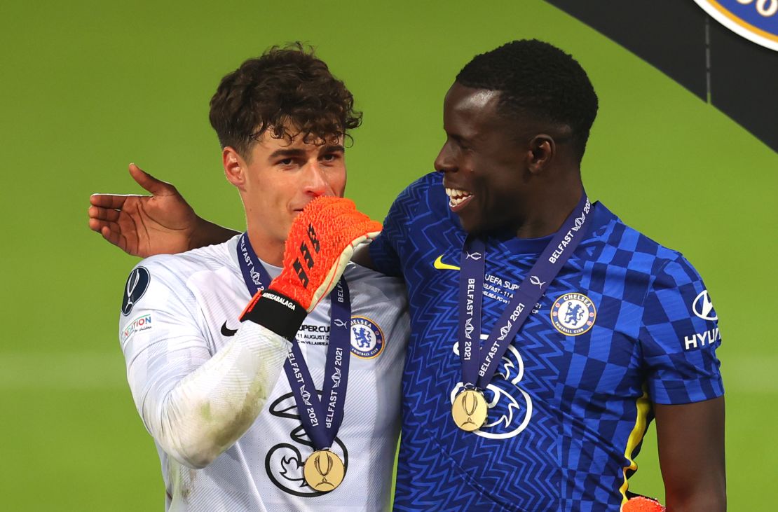 Kepa (left) celebrates Chelsea's Super Cup victory with Kurt Zouma.