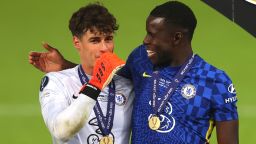 BELFAST, NORTHERN IRELAND - AUGUST 11: Kepa Arrizabalaga and Kurt Zouma of Chelsea celebrate on the podium after their team's victory on penalties during the UEFA Super Cup 2021 match between Chelsea FC and Villarreal CF at the National Football Stadium at Windsor Park on August 11, 2021 in Belfast, Northern Ireland. (Photo by Catherine Ivill/Getty Images)