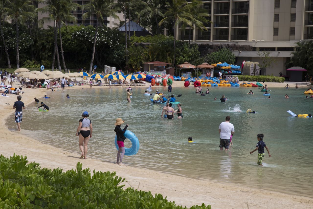 Beachgoers enjoying an August day in Honolulu, Hawaii, in 2018. 