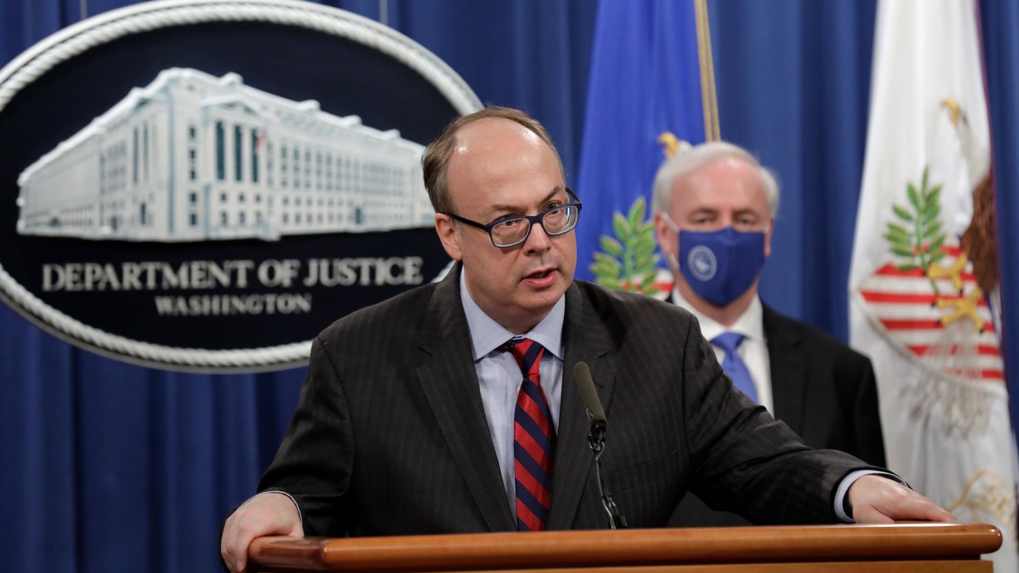 Then-acting Assistant US Attorney General Jeffrey Clark speaks next to then-Deputy US Attorney General Jeffrey Rosen at a news conference at the Justice Department on October 21, 2020, in Washington, DC. 