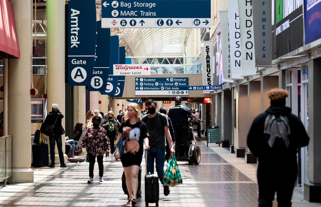 Amtrak passengers walk through Union Station in Washington on Tuesday, June 1, 2021.