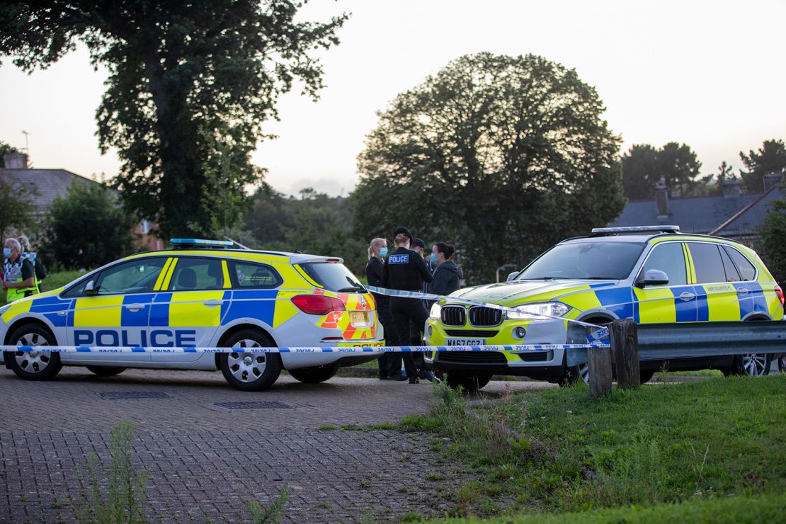 Police at the scene of a shooting Thursday in Plymouth, England.