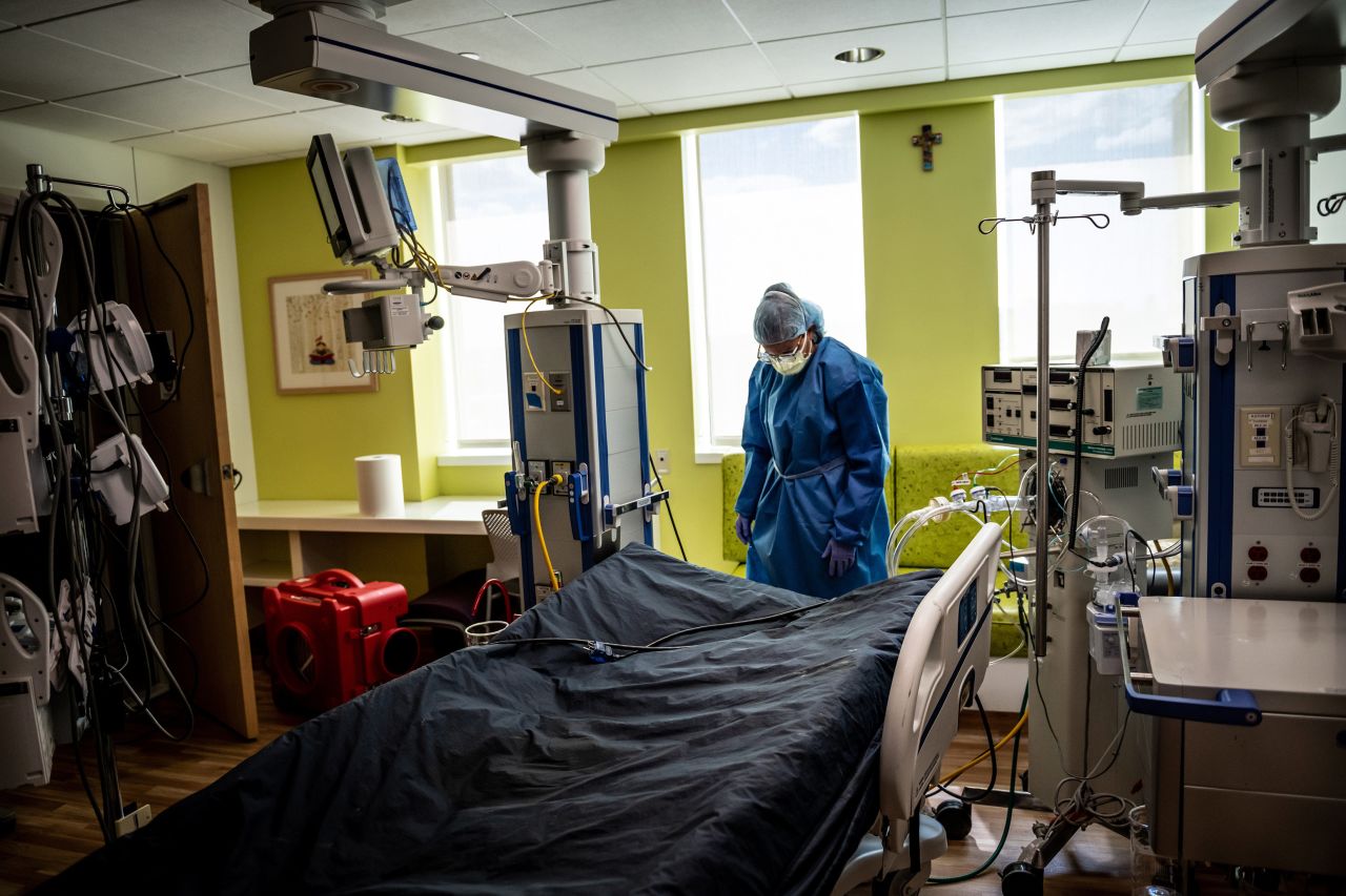 Anne Marie Baker, a nurse at the Children's Hospital of San Antonio, disinfects the room of a teenager who had just died from Covid-19 on Tuesday, August 10. With lagging vaccination rates and the spread of the more transmissible Delta variant, Texas and some other states <a href="https://www.cnn.com/2021/08/12/us/texas-covid-surge-hospital-staff-masks/index.html" target="_blank">are seeing a surge in Covid-19 cases.</a>
