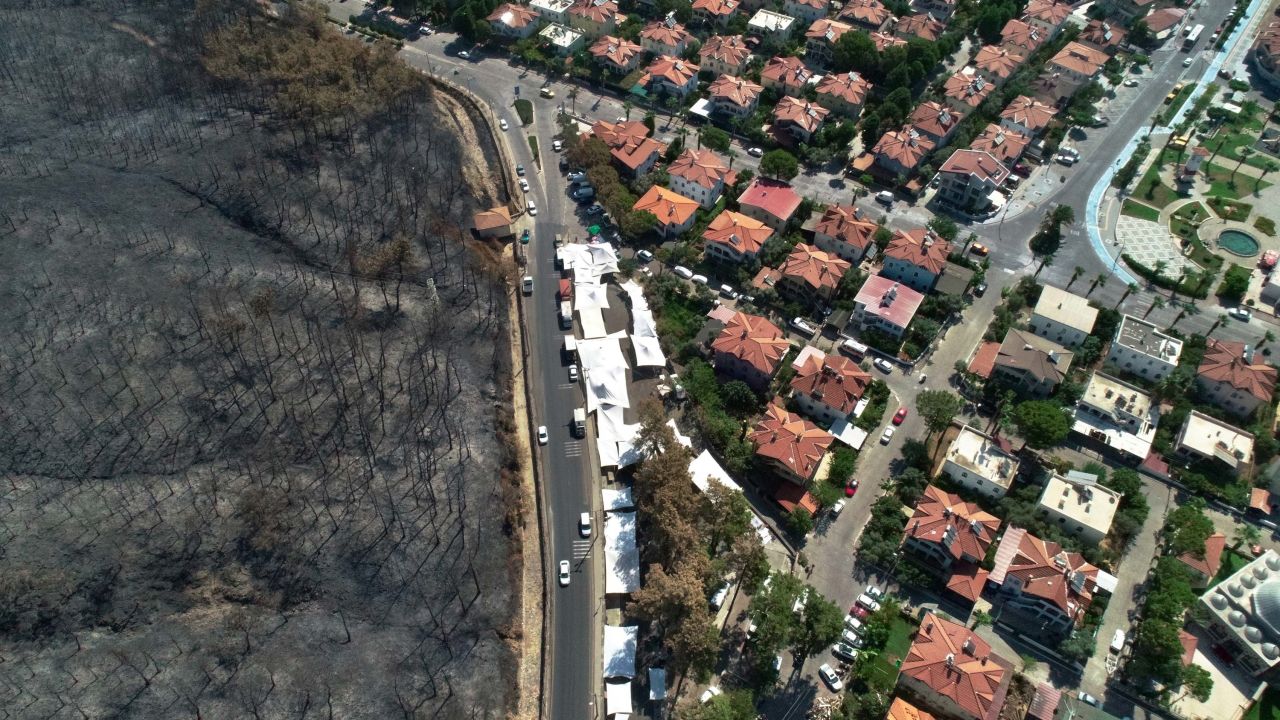 This aerial photo shows a wildfire-affected area in Mugla, Turkey, on Wednesday, August 11. A summer of record-setting heat in southern Europe has set off <a href="https://www.cnn.com/2021/08/06/world/gallery/europe-extreme-summer-weather-2021/index.html" target="_blank">devastating wildfires</a> that have torn through forests and homes and destroyed vital infrastructure from Turkey to Spain.