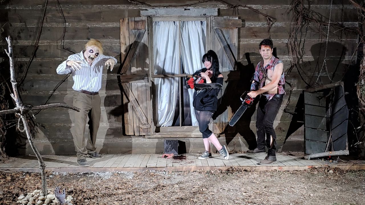 Customers seen dressed up in character pose in an artistic set accompanying a film at Mahoning Drive-In Theater in Leighton, Pennsylvania in late August 2020.