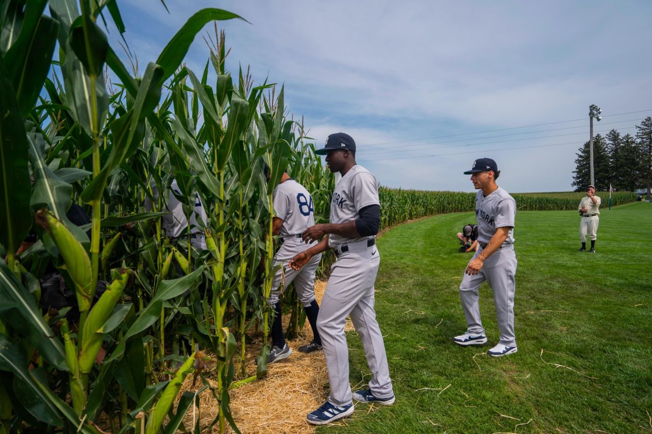 <strong>From movie set to MLB ballpark:</strong> Players entered the cornfield from the "Field of Dreams" movie field adjacent to the new stadium. 
