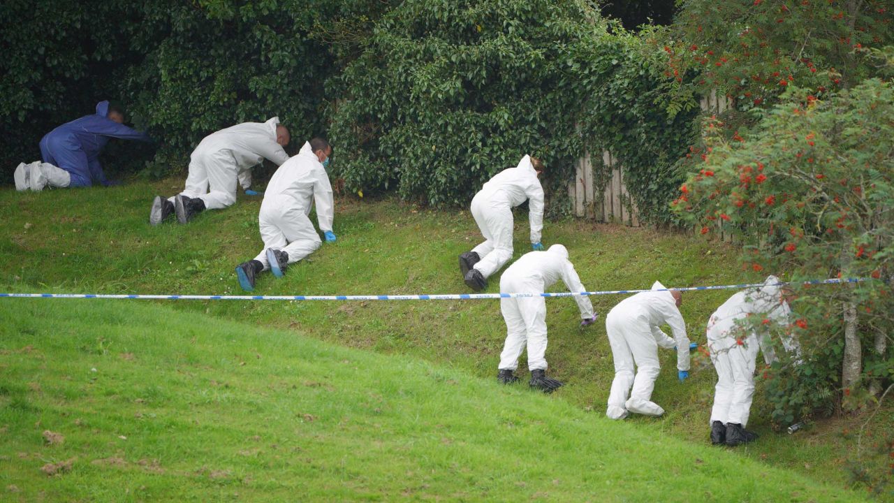 Forensic officers search the Keyham area of Plymouth, England, on Friday a day after a gunman shot dead five people before killing himself. 