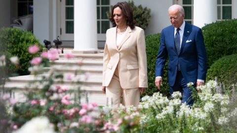 US President Joe Biden and US Vice President Kamala Harris (L) arrive for a ceremony commemorating the 31st anniversary of the Americans with Disabilities Act (ADA), in the Rose Garden of the White House in Washington, DC, on July 26, 2021.