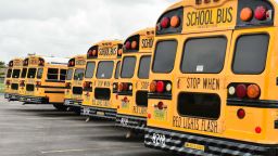 PEMBROKE PINES, FL - JULY 21: A fleet of Broward County School Buses are parked in a lot on July 21, 2020 in Pembroke Pines, Florida. Florida's largest teachers Union filed a suit against the State's Governor Ron DeSantis and Commissioner Corcoran about reopening as the number of coronavirus cases in the state is spiking. Education Commissioner Richard Corcoran, Florida Governor DeSantis on Monday July 6 ordered brick and mortar public schools to reopen on August 19 for the 2020/21 calendar school year following the lead of United States Secretary of Education Betsy DeVos and President Trump. With a surge in COVID-19 cases spiking in Florida the teacher's union accused Governor DeSantis and other state officials of violating a state constitutional mandate to keep public schools "safe and secure."  (Photo by Johnny Louis/Getty Images)