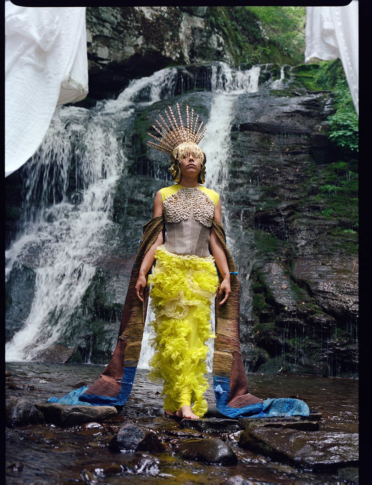 Rodriguez's "Oshun Orisha of Fertility: Help Us Birth Generations of Revolutionary Womxn" was modeled by her friend and fellow artist Patricia Encarnacion. 