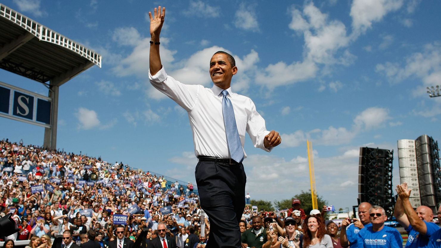 Then-Democratic presidential nominee Barack Obama waves during a campaign event on October 20, 2008, in Tampa, Florida.