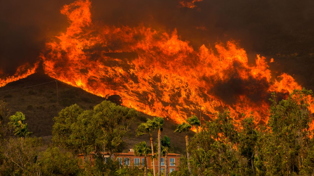 The Woolsey Fire approaches homes on November 9, 2018 in Malibu, California.