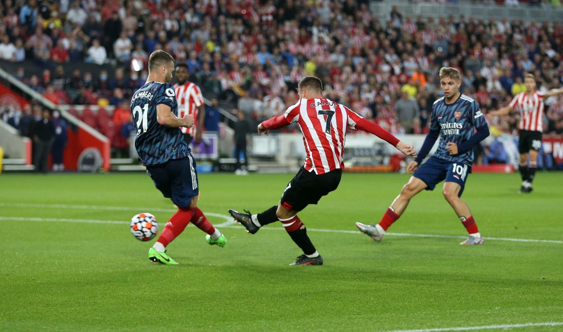 Brentford's Sergi Canos scores his side's first goal against Arsenal.