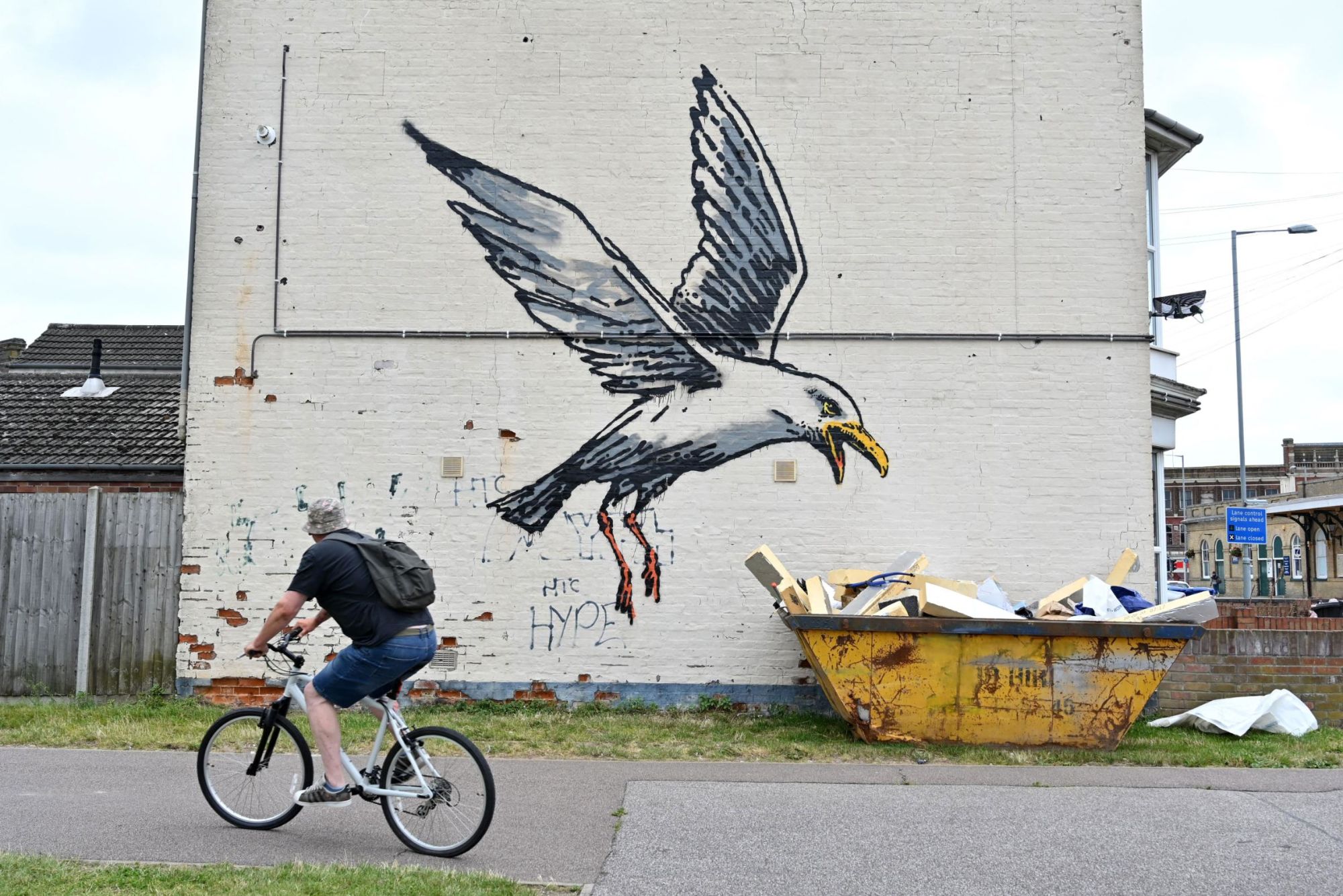 Banksy strikes again! Artist confirms he is behind 'spraycation' artworks  in British coastal towns