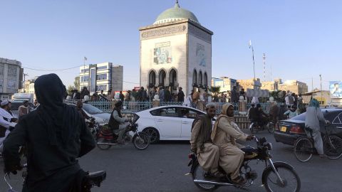 Taliban militants gather a day after taking control of Kandahar on August 14.