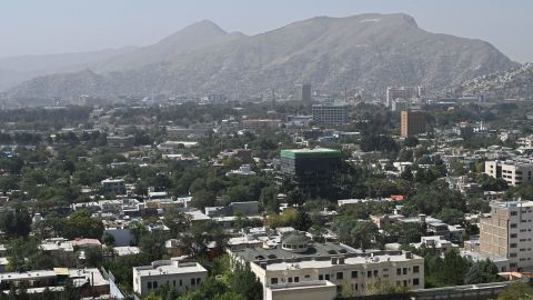 This picture taken from the top of a hillside shows a general view of Kabul on August 15.