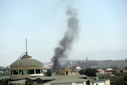 Smoke rises next to the U.S. Embassy in Kabul, Afghanistan, on Sunday, August 15, 2021.