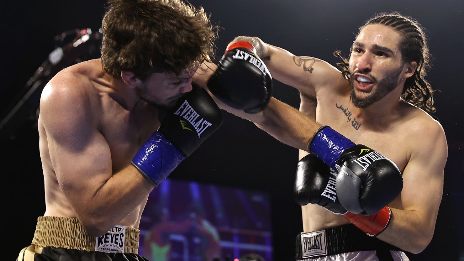 Jordan Weeks (L) and Nico Ali Walsh (R) exchange punches during their fight at the Hard Rock Hotel & Casino Tulsa on August 14, 2021 in Catoosa, Oklahoma. 