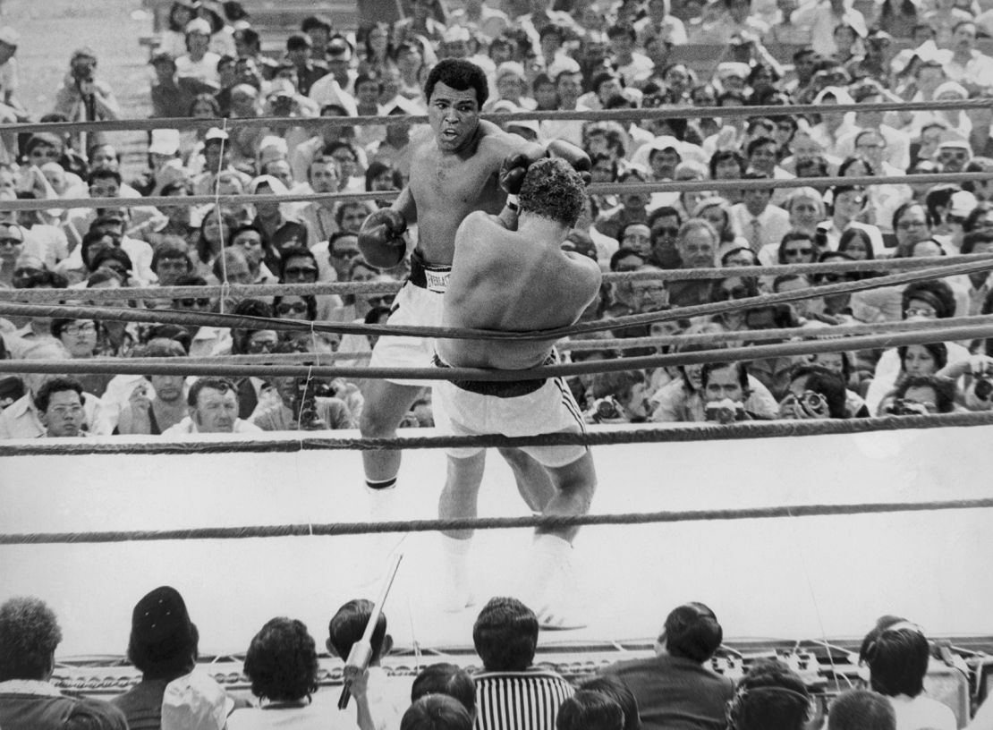 July 5 1975: Ali fights Hungarian-born British boxer Joe Bugner in their title fight at the Merdeka Stadium in Kuala Lumpur. Ali won the fight to keep his world heavyweight title.  