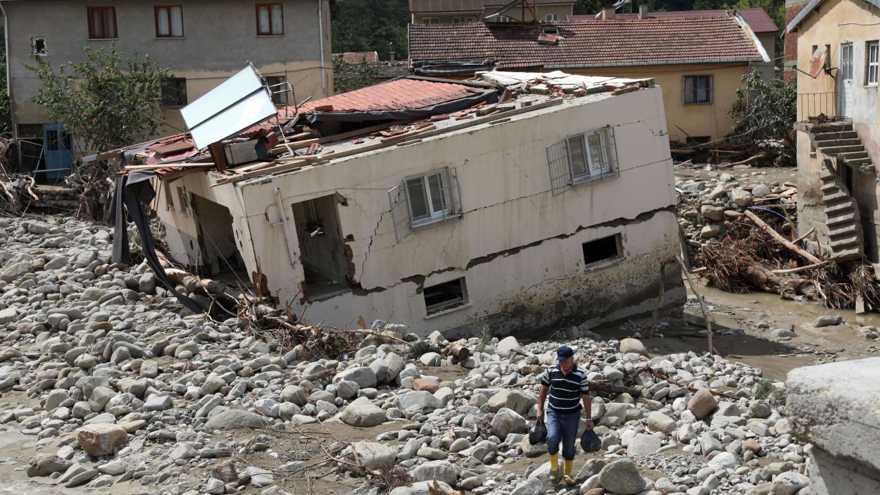 A drone photo shows Babacay village after flooding caused by heavy rains in the Ayancik district of Sinop, Turkey, on Saturday.