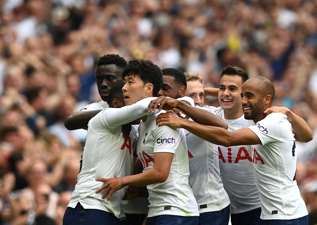 Son celebrates with his teammates after scoring against Manchester City.