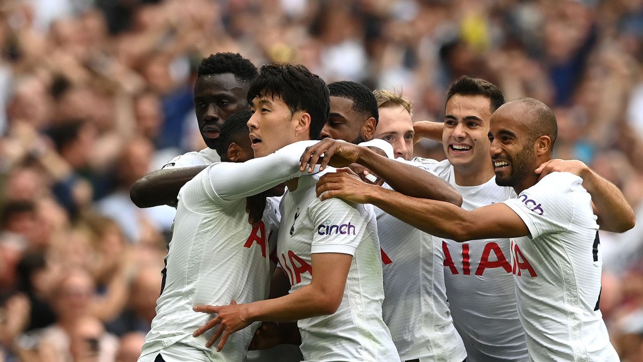 Son celebrates with his teammates after scoring against Manchester City.