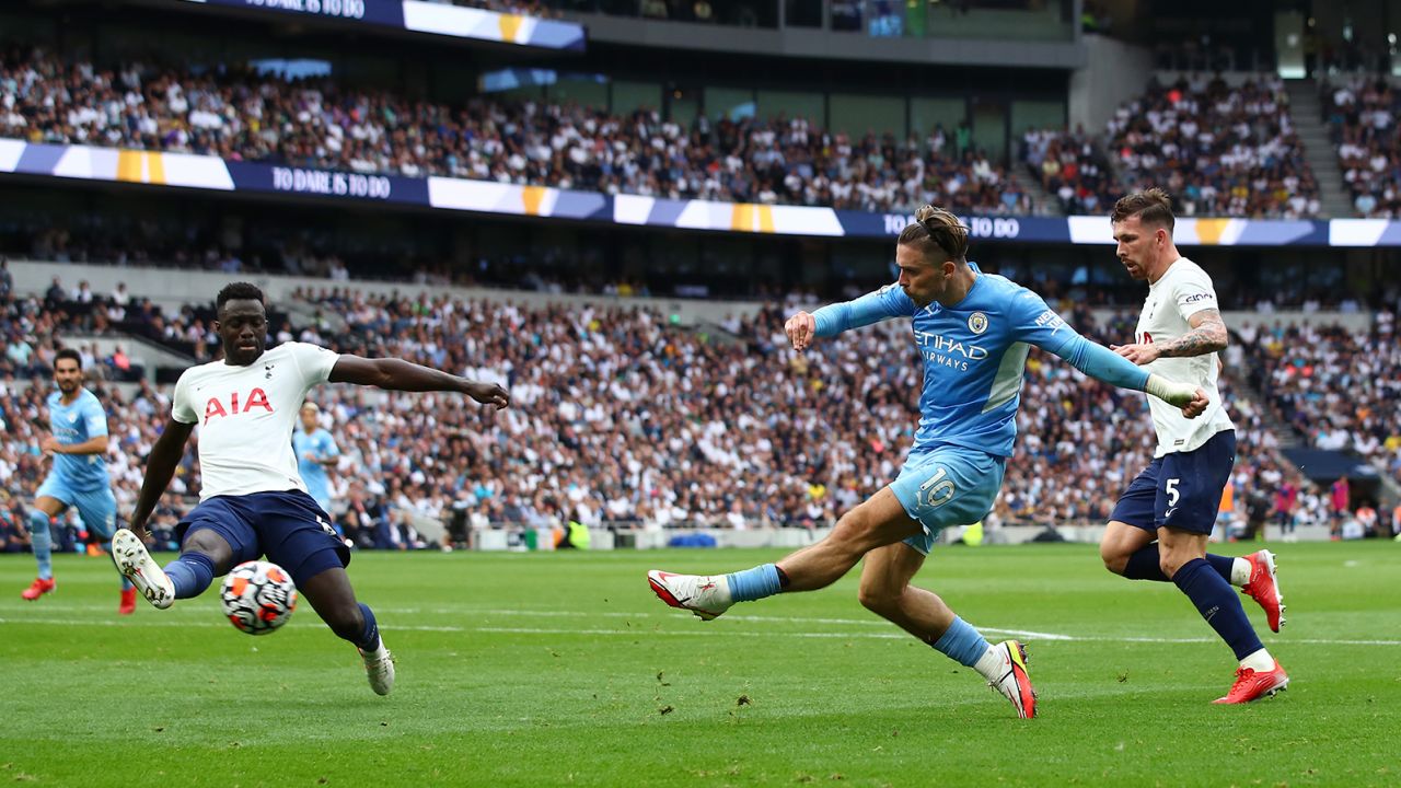Manchester City's Jack Grealish shoots during the Premier League match against Tottenham Hotspur.