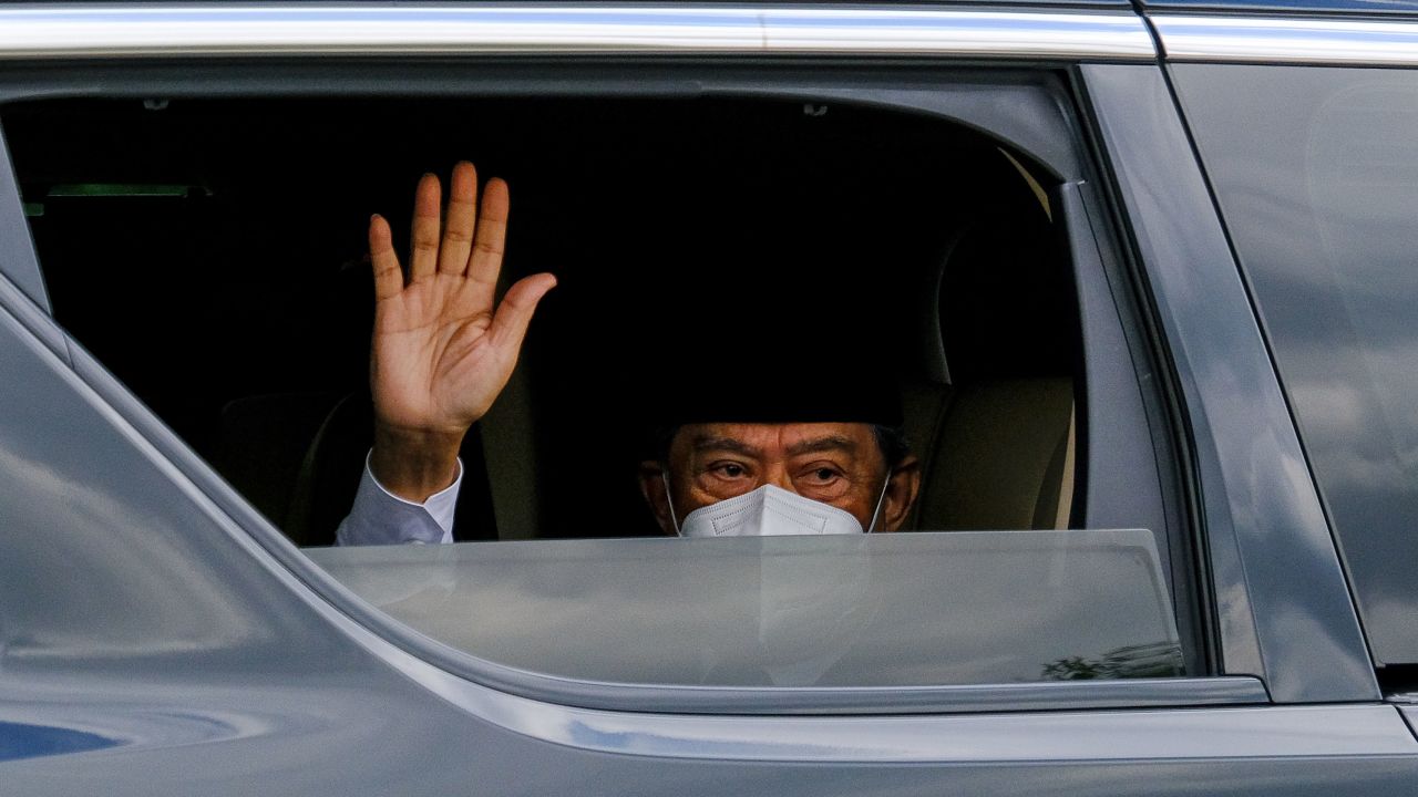 Muhyiddin Yassin, Malaysia's prime minister, waves from his vehicle as he arrives at the Istana Negara palace in Kuala Lumpur Malaysia, on Monday.
